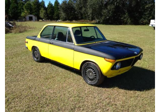 Illustration for article titled How To Stay Classy In A BMW 2002 Without Breaking The Bank